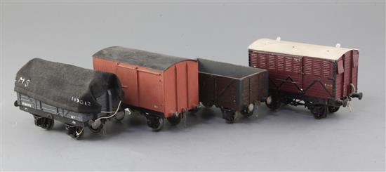An open wagon, in brown, a box van, no.M232576, in red, a horse box, LMS no.6510, in red and a covered